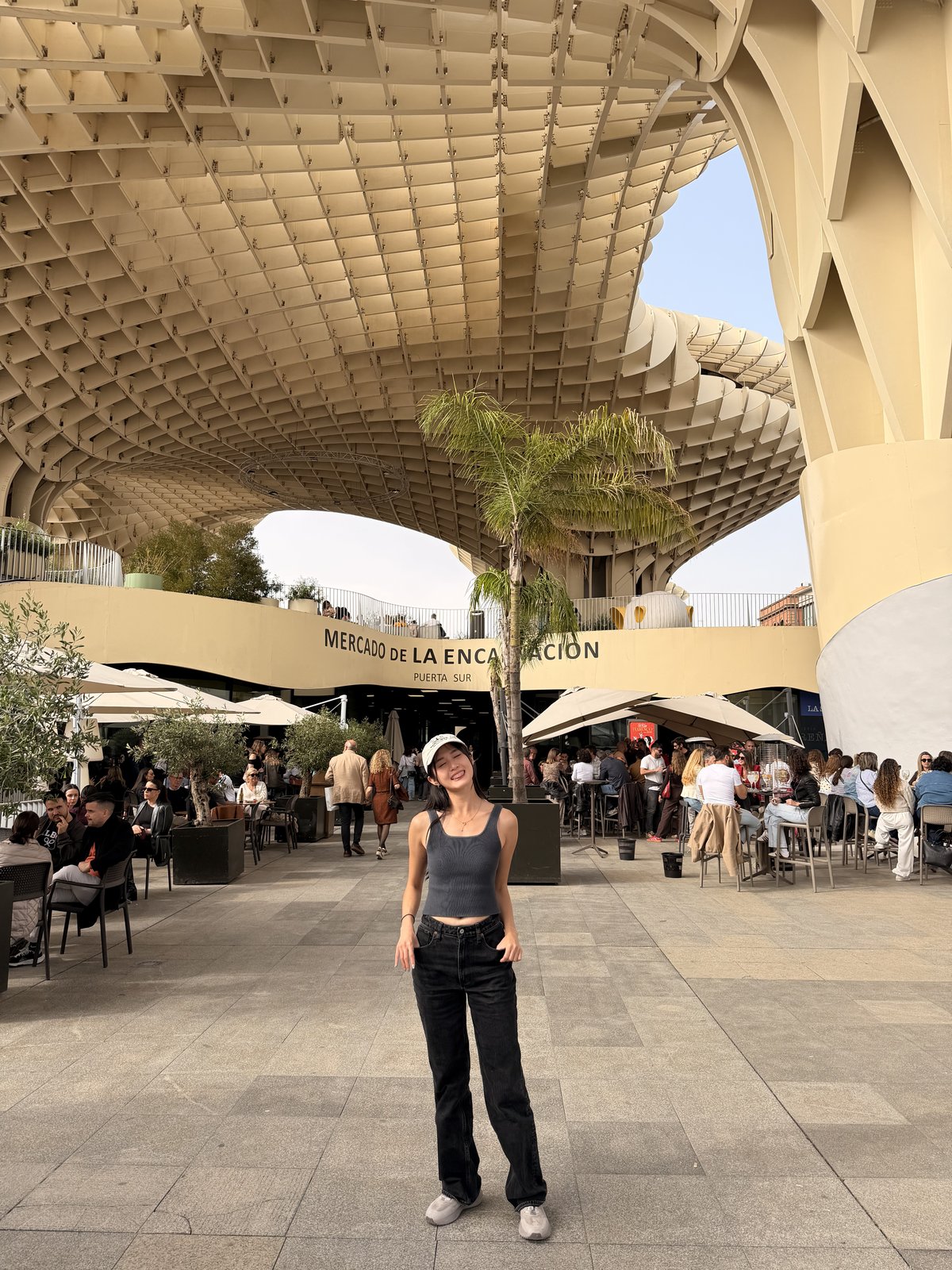 Standing under the honeycomb wooden canopy of Las Setas in Seville
